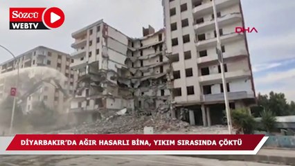 Скачать видео: Diyarbakır'da ağır hasarlı bina yıkım sırasında çöktü