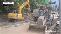 Roads cleared after flash flood in India