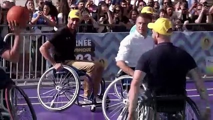 France's Macron tries wheelchair basketball