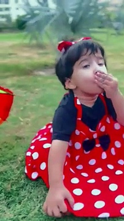 Cute baby playing in park