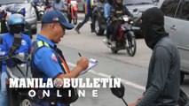 MMDA issues tickets to motorcycle riders violating lanes along EDSA