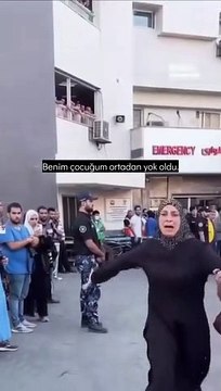 Füzelerin vurduğu Gazze'de iki evladını kaybeden annenin feryadı yeri göğü inletti: Çocuklarımı açken katlettiler
