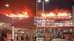 Luton airport fire: Video shows flames engulfing terminal car park as flights suspended