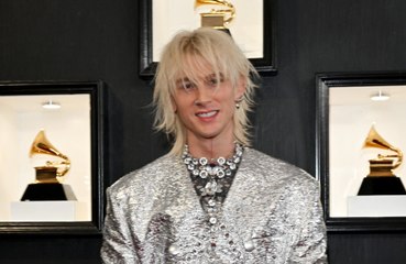 Machine Gun Kelly confronted by stage invader