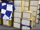 Tokyo Olympic Games uniforms for 28,000 volunteers remain unused