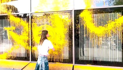 Just Stop Oil activist paints Manchester University building orange