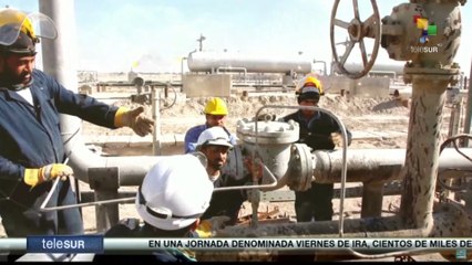 Foto del Día: Operarios petroleros en yacimiento ruso en Irak