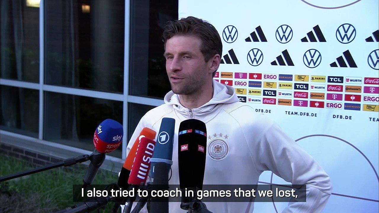 'That's rad' - Muller interview interrupted by Christmas music