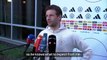 'That's rad' - Muller interview interrupted by Christmas music