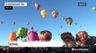 Hot air balloons soar through the sky at annual International Balloon Fiesta in Albuquerque