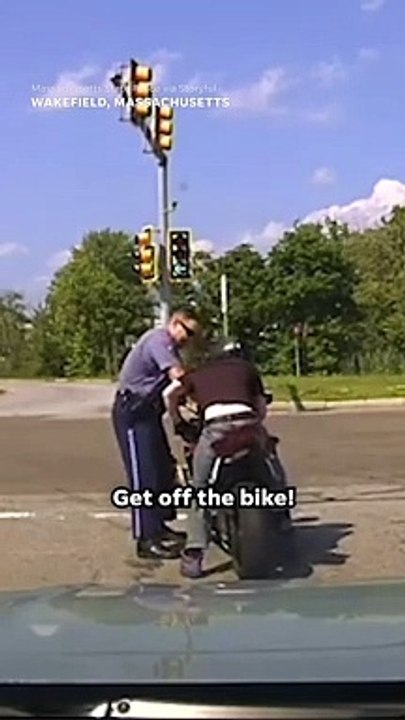 Motorcyclist drives state trooper into oncoming traffic #Shorts