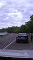 Dashcam video shows officer on side of road narrowly escape careening BMW #Short