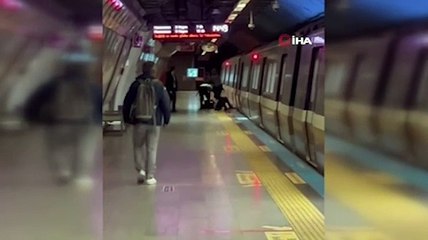 Metroda korkutan anlar! Raylara düşen genç kıl payı kurtarıldı