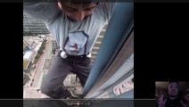 Man was climbing the building telling the police to chill out!