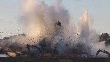 Piers demolished in spectacular implosion as works continue on old I-74 bridge