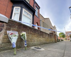 Flowers in Wharton Terrace, Hartlepool, as a police murder inquiry continues