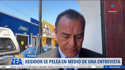 Regidor de San Pedro Cholula se pelea en medio de una entrevista