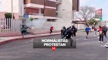 Cierran negocios en Michoacán por marcha de normalistas