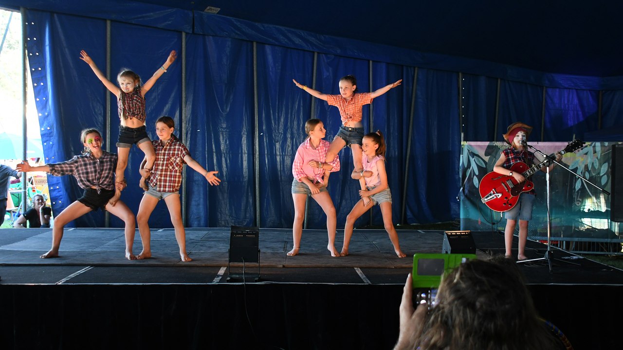 Travis McLaughlin Ifield plays a song with the Circartus Acrobats