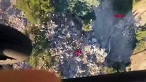 Fethiye'de kayalıklara düşen paraşütçü böyle kurtarıldı