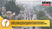 Kabut asap masih menyelimuti Kota Pekanbaru, jarak pandang pada pagi hari sekitar dua kilometer