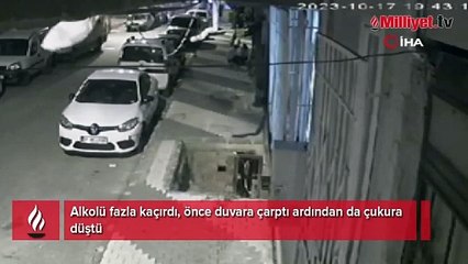 Duvara çarpıp çukura düşen alkollü şahsın ilginç anları kamerada