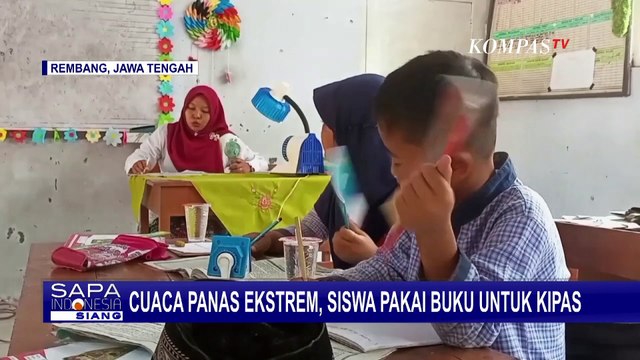 Cuaca Panas Ekstrem, Siswa di Rembang Pakai Buku untuk Kipas