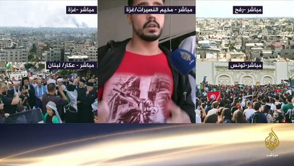 _دُمر وكأنه لم يكن_.. فلسطيني يُخرج من بين الركام ربطة خبز