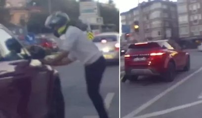 Motosiklet sürücüsünün üzerine aracını sürdü! Şoke eden anlar