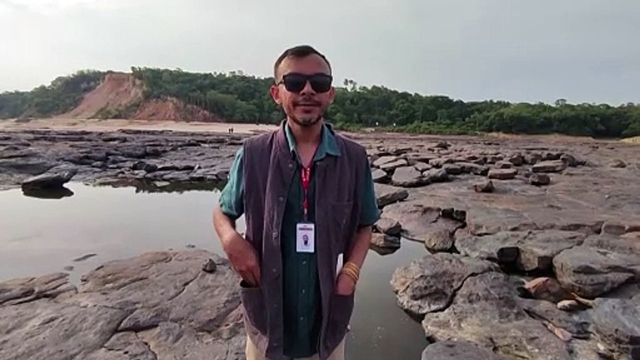 Drought exposes Amazon rocks with human faces