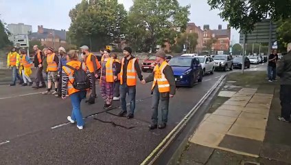 Download Video: Just Stop Oil brings Southsea to standstill as protestor pushed by disgruntled member of the public