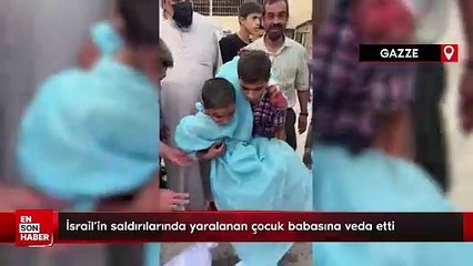 İsrail'in Gazze'ye yönelik saldırılarında yaralanan çocuk babasına veda etti