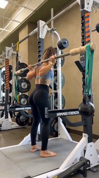 Amazing Lower Body Workout - utilizing kettlebells hanging on bands to challenge balance and stability while proving an incredible workout. This is a bamboo bar but a regular bar can be utilized