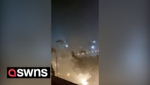 Video shows strong winds and palm trees swaying as Hurricane Otis makes landfall