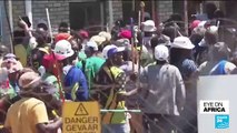 South African miners return to surface after underground union dispute