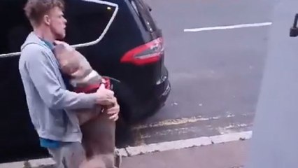 Man overwhelmed upon receiving a paw-recious welcome home after two days