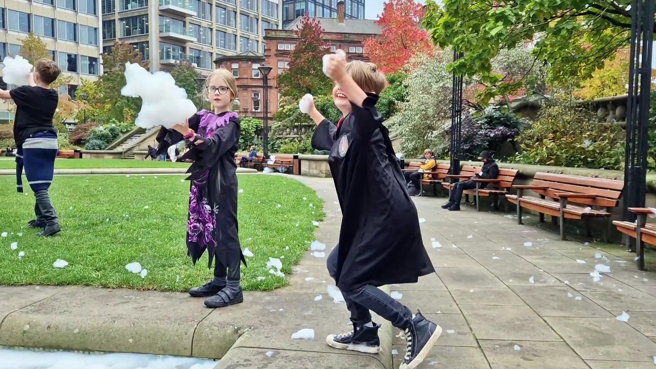 Delighted children in Sheffield play with foam after mischief-makers pour detergent in Peace Garden fountains