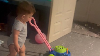 Playful boy is soap-er interested in his cool new toy