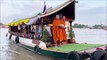 Tradition of giving alms by boat at Koh Kret Island In Thailand