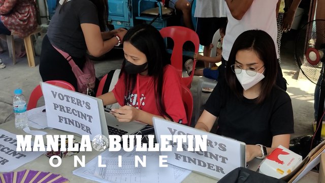Voters' assistance desks help Caloocan residents locate their names and voting precinct