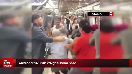 Metroda tükürük kavgası kamerada