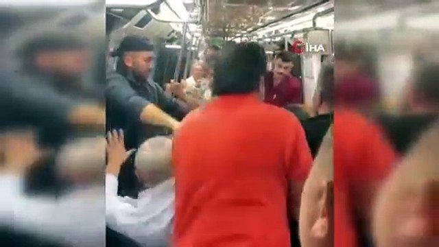 Metroda 'tükürük' kavgası kamerada: Metro boks ringini aratmadı