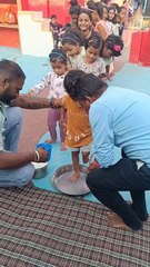 रावतभाटा वार्ड नंबर 22 चर्च बस्ती दुर्गा माता मंदिर पर कन्याओ के पैर धोकर पानी साफ किया गया