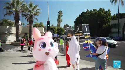 Actors on strike dressed up for Halloween