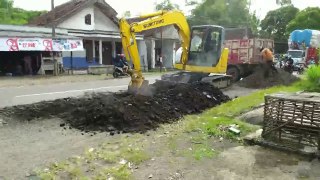 Excavator Digs Out Tower Foundation.