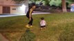 Determined toddler tries to flip like his father, ends up flopping instead!