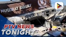 Palestinians line up outside destroyed bakery in Gaza strip