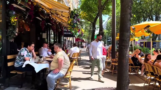 Walking around the streets around the Eiffel Tower in Paris in summer