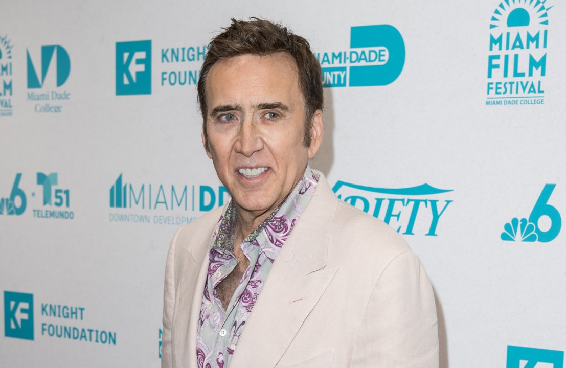 Nicolas Cage bought a TWO-HEADED SNAKE after a dream