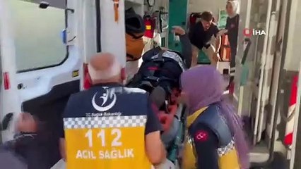 Kazada yaralandı ama çantasını asla bırakmadı